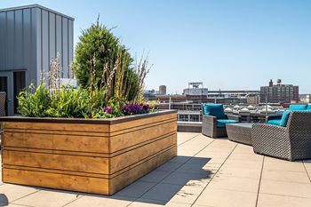 Rooftop deck with downtown and river views